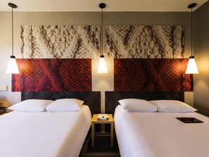 Memory-foam beds, in-room safe, desk, soundproofing