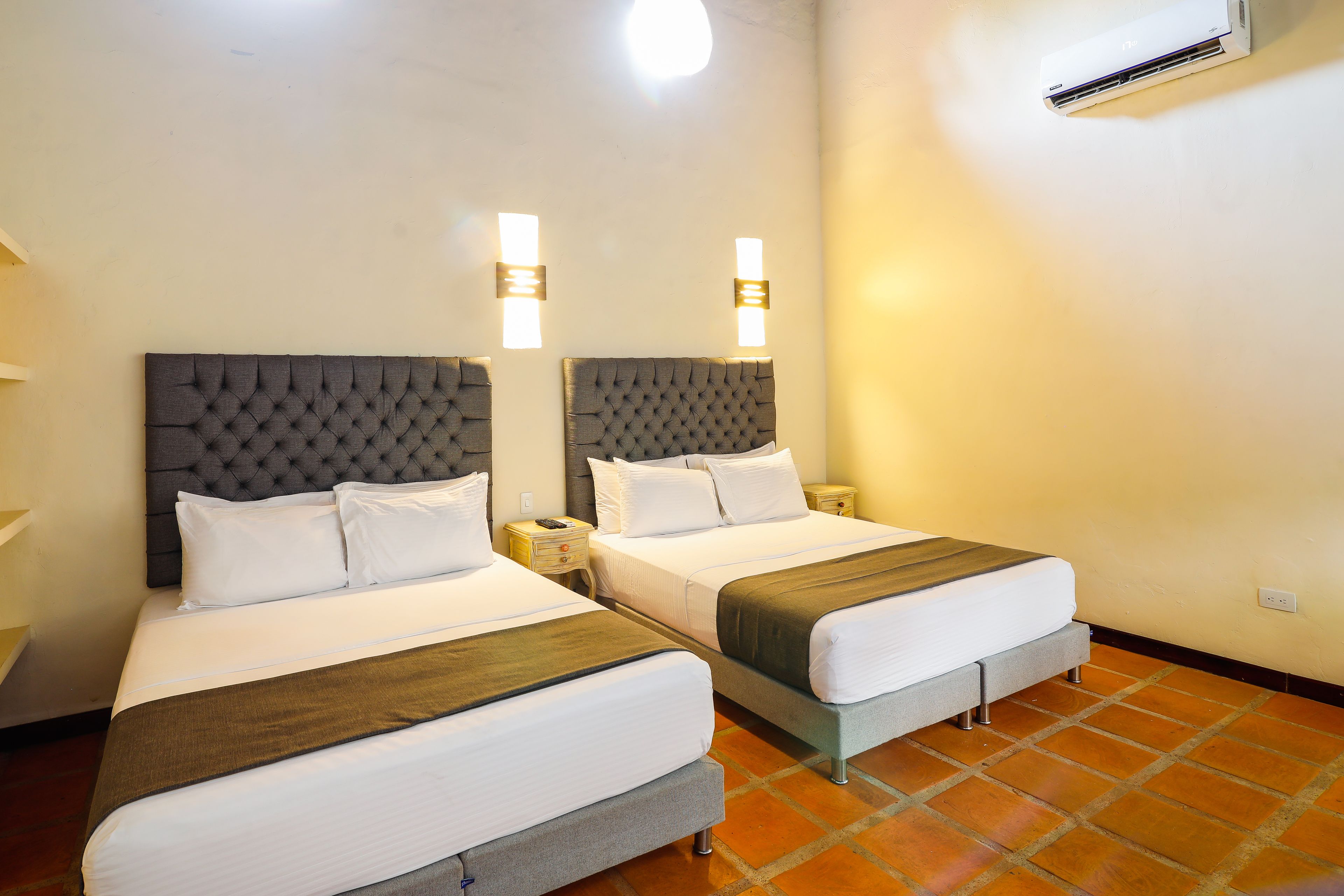 family room, 2 double beds, non smoking | premium bedding, pillow-top beds, in-room safe, individually decorated