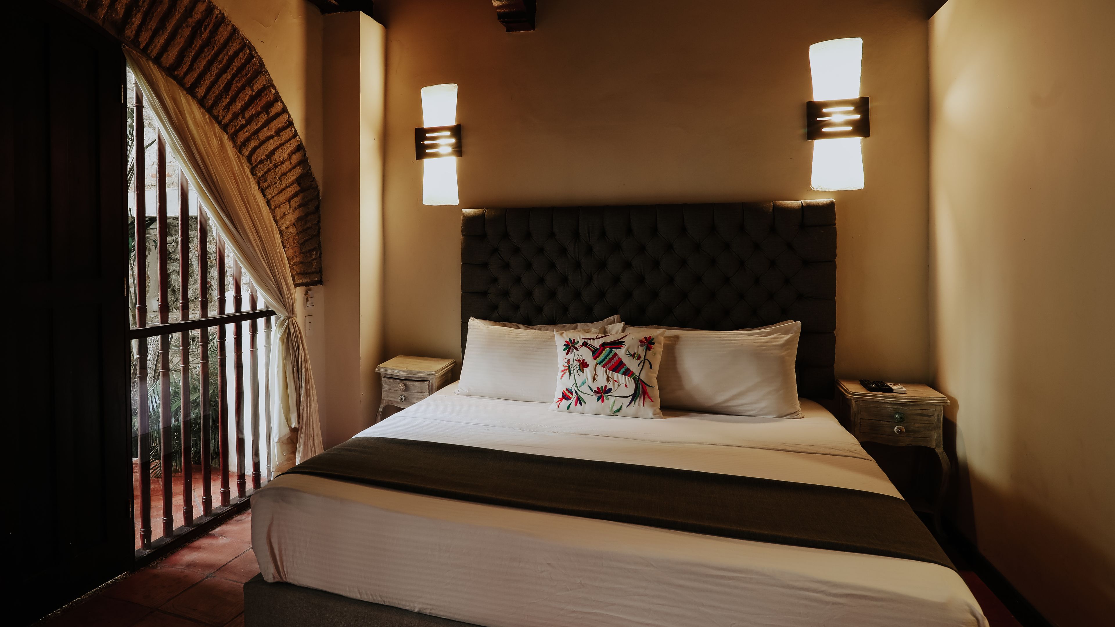 deluxe room, 1 king bed, non smoking, balcony | premium bedding, pillow-top beds, in-room safe, individually decorated