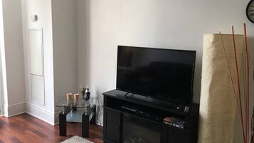 43-inch flat-screen TV with premium TV channels, LCD TV, Netflix