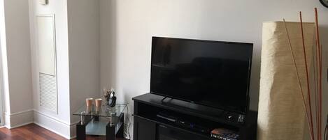 43-inch flat-screen TV with premium TV channels, LCD TV, Netflix