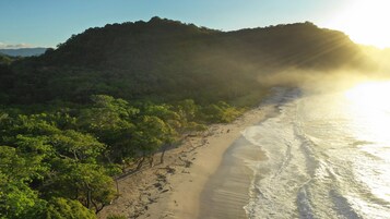 On the beach, white sand