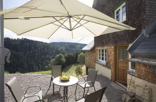 Stand alone Vacation Rental in the forest in modern restored historic farmhouse