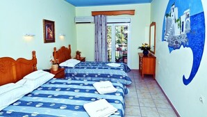 A hotel room with two beds, a large mural, and a view of the outdoors. - Ionia (Skopelos)