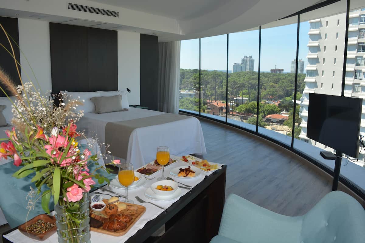 grand room, multiple beds | premium bedding, minibar, in-room safe, desk