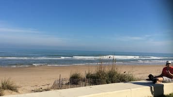 On the beach, sun loungers