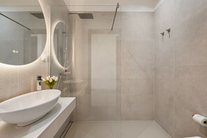 Shower, free toiletries, hair dryer, towels