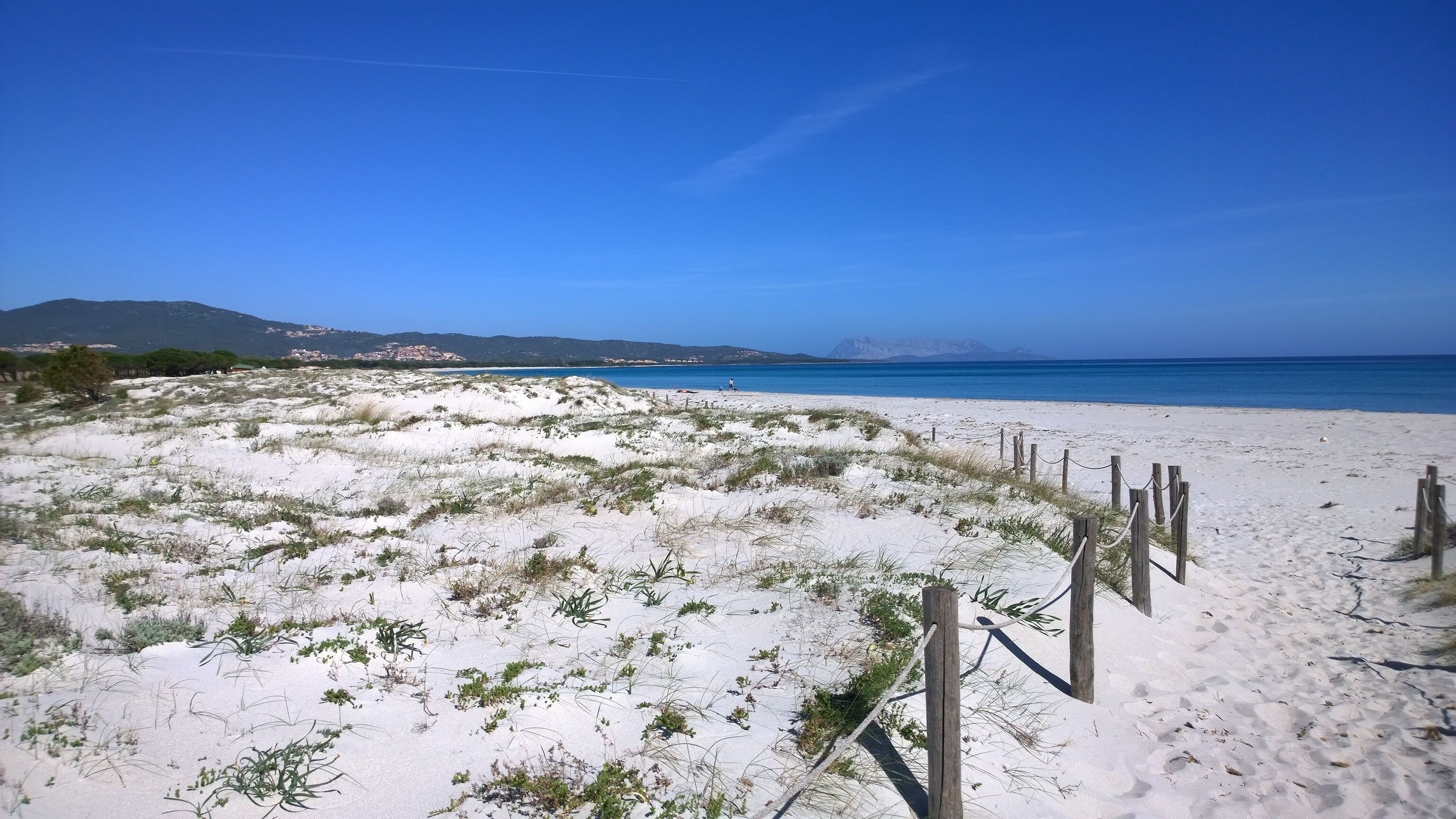 On the beach, sun loungers