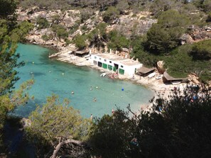On the beach, sun loungers, beach towels