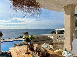 Outdoor dining - 180 degree sea view ***** 1st sea line, private*large pool*great garden *WIFI (Cala Pi)