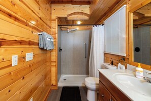 Combined shower/bathtub, hair dryer, towels, soap