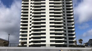 A high-rise building with multiple balconies and a flat facade. - Luxury Ocean Front 2br/2ba Horizons Condo17th Floor - Awesome views (Daytona Beach)