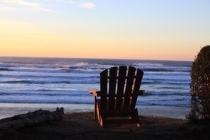 On the beach, sun-loungers, beach towels - On the Beach. Yes, on the Beach.  It's all about the View and being on the Beach (Arch Cape)