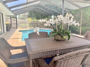 Outdoor dining - Relaxing 3BR/2Ba Oasis with Heated Pool. (Sarasota)