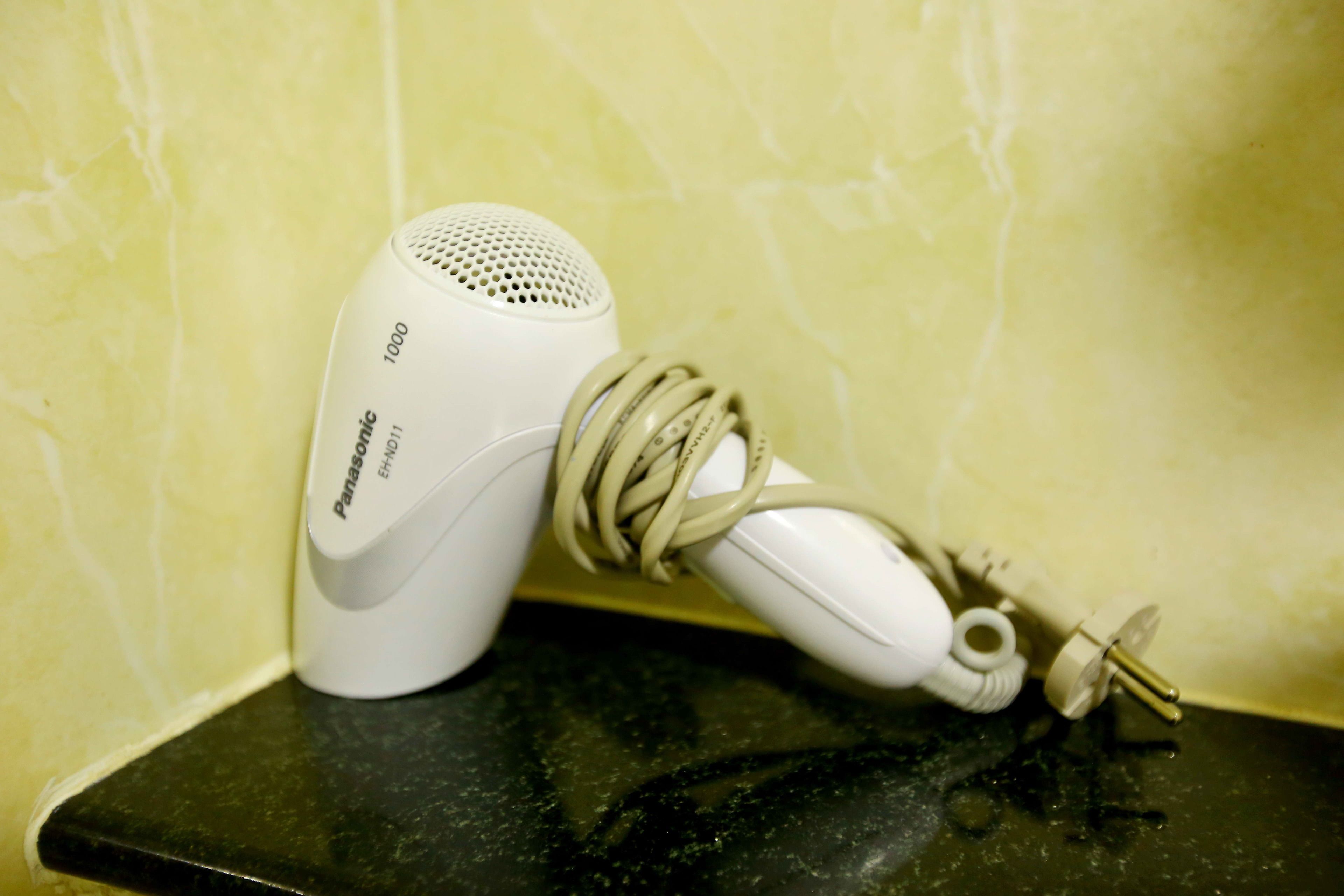 shower, rainfall showerhead, designer toiletries, hair dryer