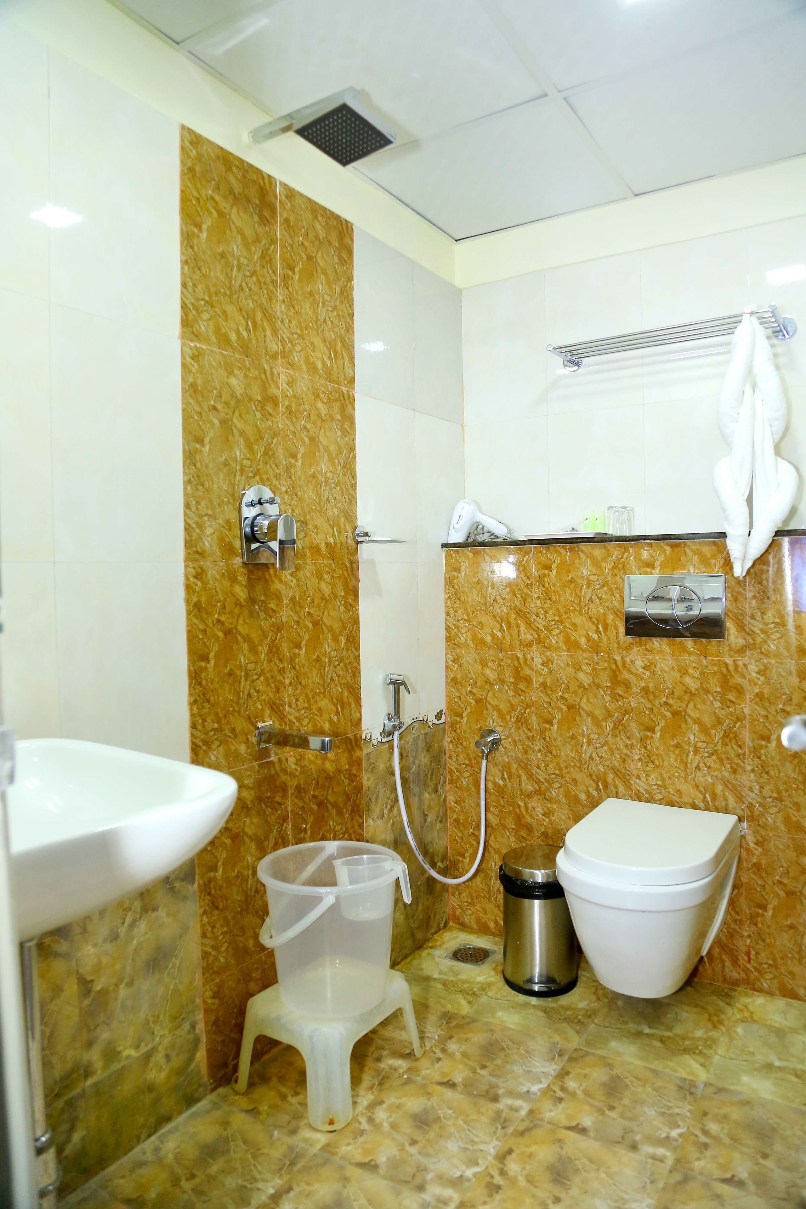 superior double or twin room | bathroom | shower, rainfall showerhead, designer toiletries, hair dryer