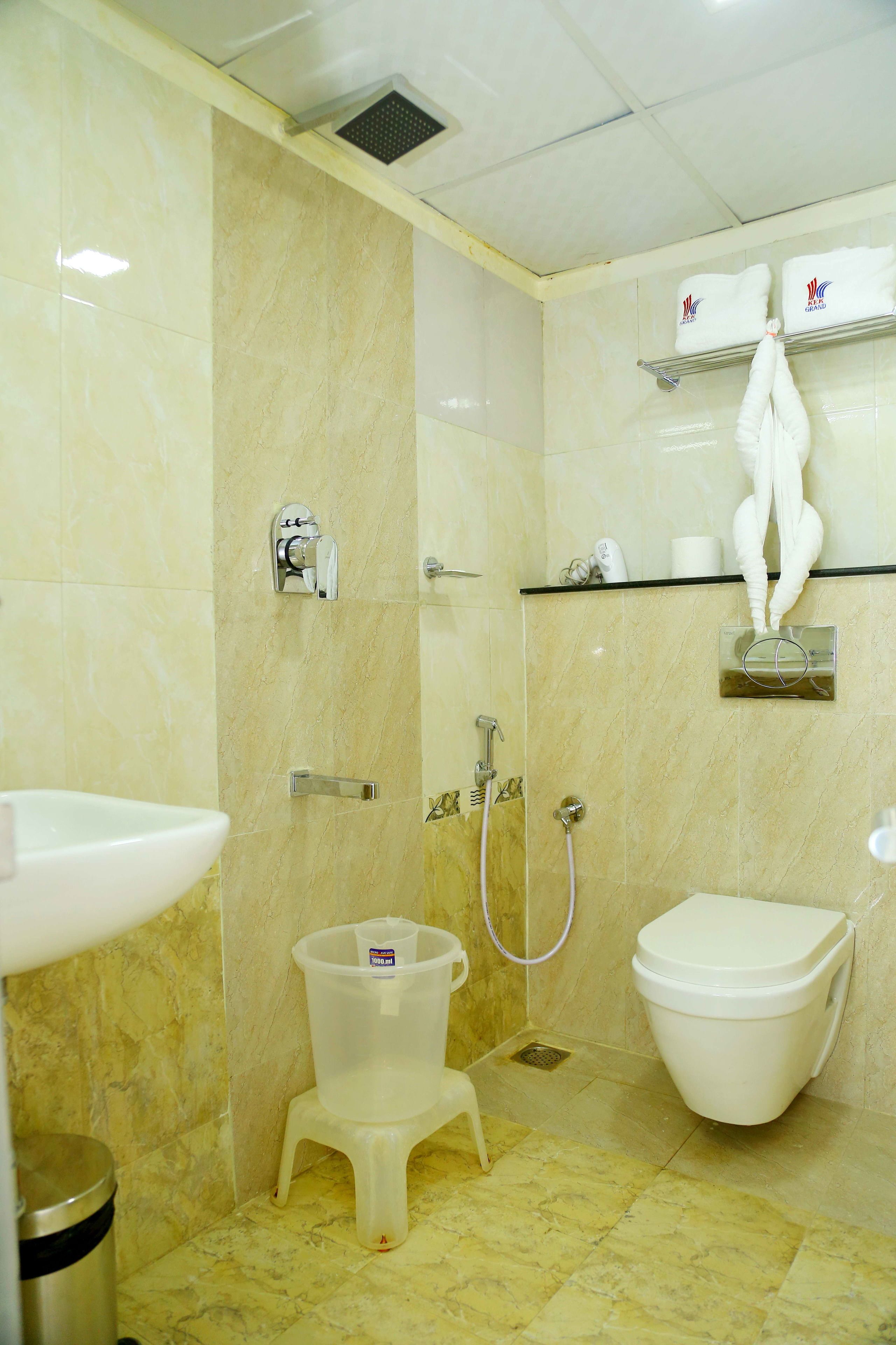 standard double room | bathroom | shower, rainfall showerhead, designer toiletries, hair dryer