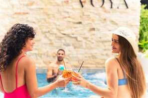 Outdoor pool, open 8:00 AM to 8:00 PM, pool umbrellas, pool loungers