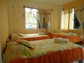 Basic Triple Room, Private Bathroom (3 Single Beds) | In-room safe, free WiFi - Hospedaje Janet (Puerto Villamil)