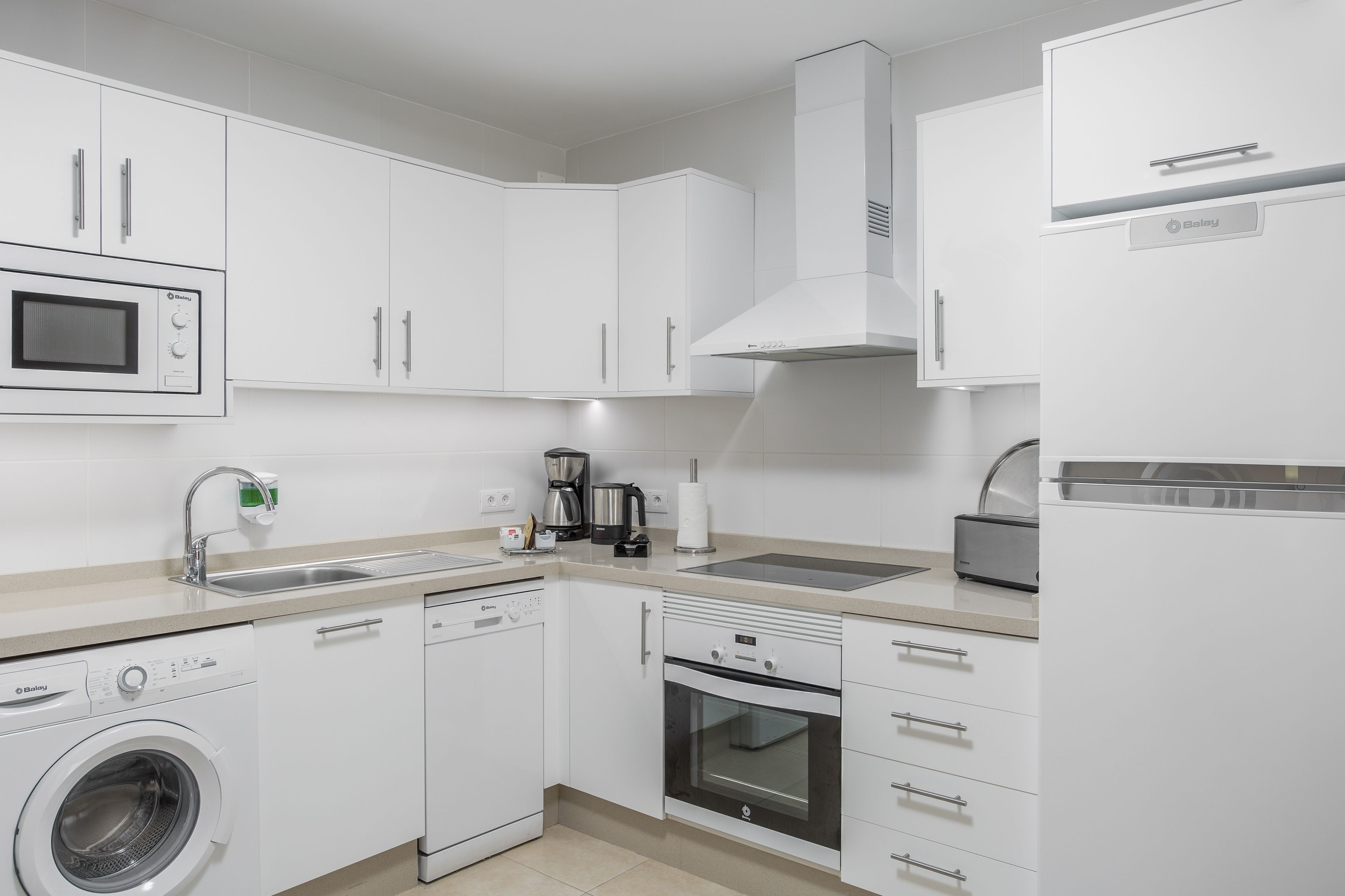 Fridge, microwave, toaster, cookware/dishes/utensils