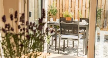 De Hüüs Achtern Sandlid - 4 Sterne Ferienhäuser in Bosau bei Plön - HAUS B