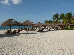 On the beach, sun-loungers, beach towels - BEACHFRONT LUXURY 3 BR CONDO 4TH FLOOR WITH PRIVATE ENTRY  ..”BEST OF THE BEST” (Cozumel)