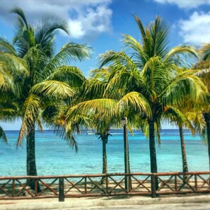 On the beach, sun loungers, beach towels