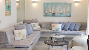 Apartment, 3 Bedrooms, Garden Area | Living room | 32-inch flat-screen TV with satellite channels, TV - Marilia Villas (Kefalonia)