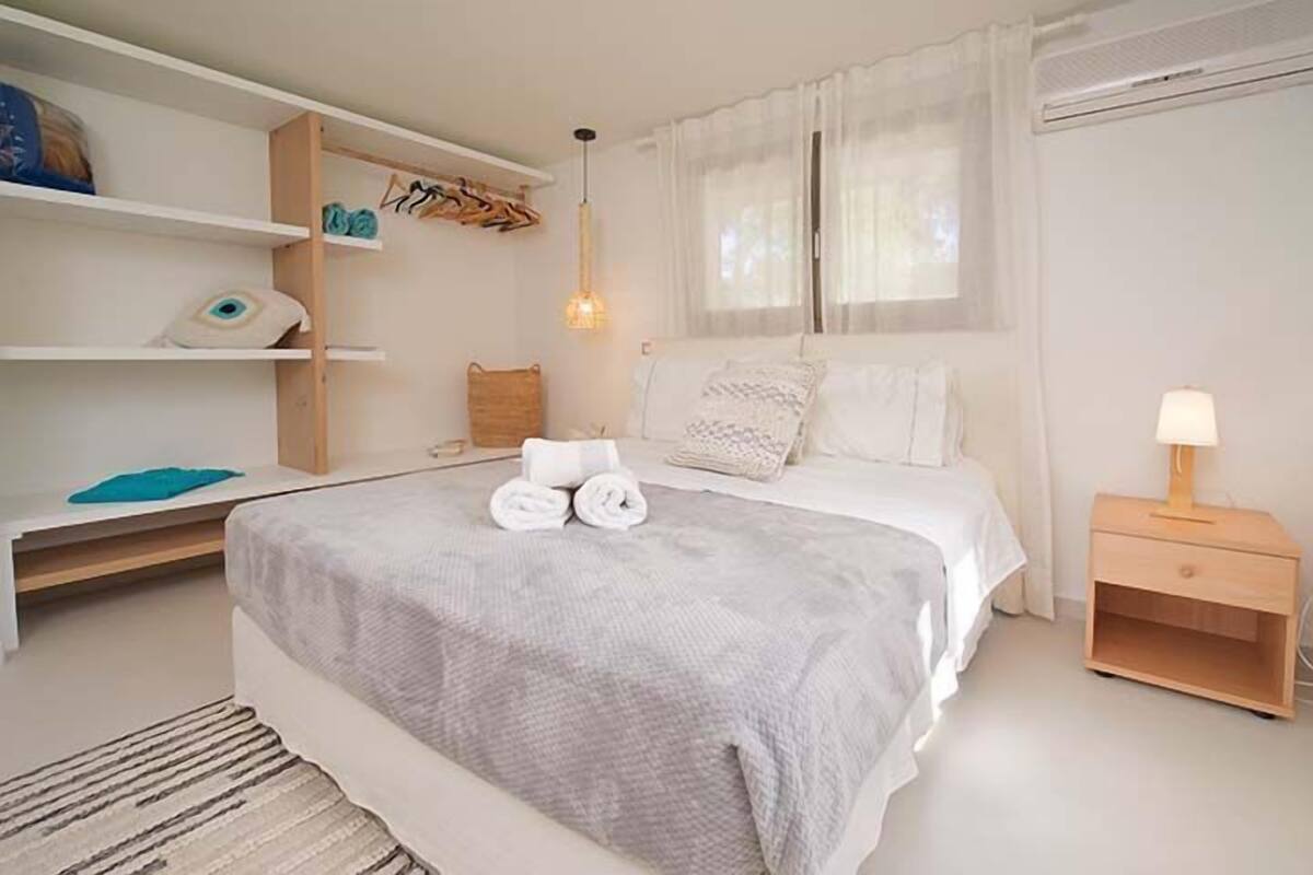 Apartment, 3 Bedrooms, Garden Area | Premium bedding, in-room safe, blackout curtains, iron/ironing board