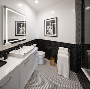 Combined shower/bathtub, hair dryer, towels, soap