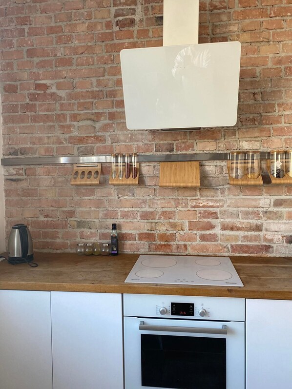 Fridge, oven, dishwasher, dining tables