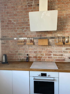 Fridge, oven, dishwasher, dining tables