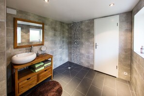 Shower, hair dryer, towels, toilet paper