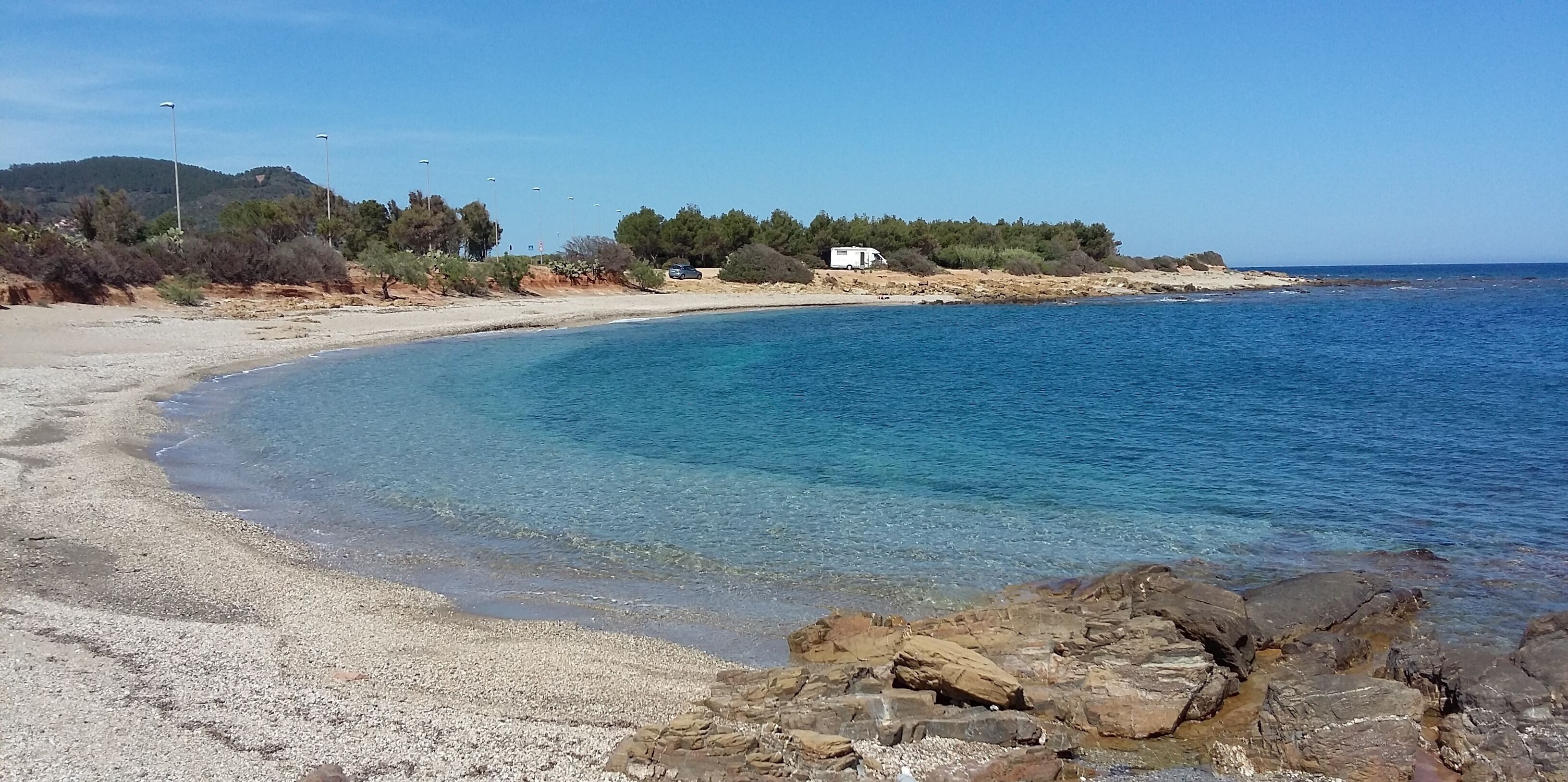 On the beach, sun loungers, beach towels