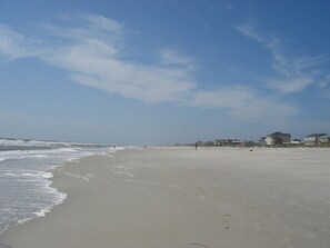 On the beach, sun loungers, beach towels