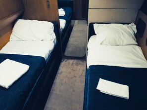 Standard Triple Room (Scirocco) | Down duvets, in-room safe, free WiFi, bed sheets - Yacht Diva (Venice)