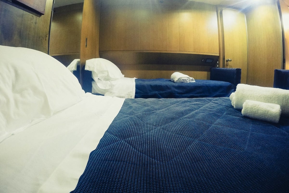 Triple Room (Libeccio) | Down comforters, in-room safe, WiFi (free), bed sheets