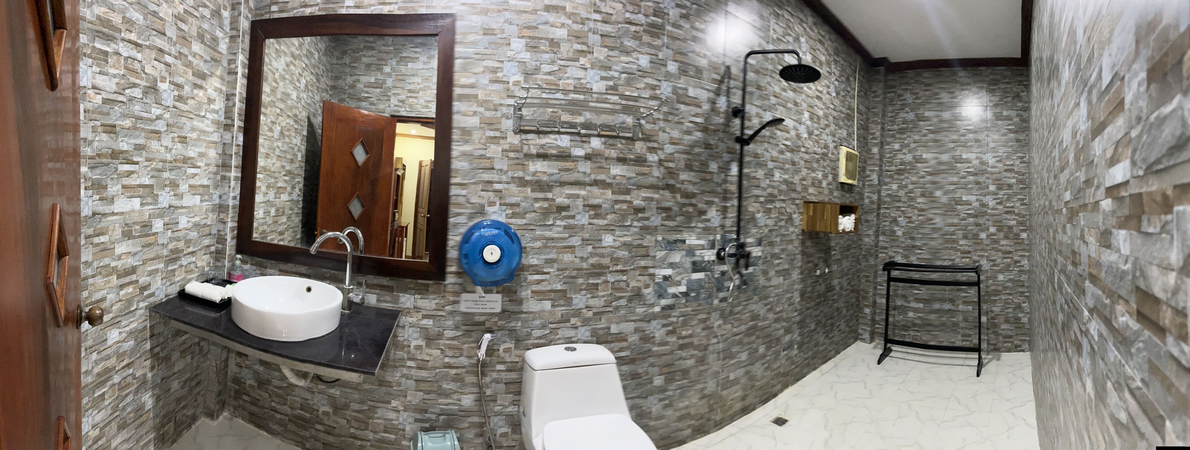 shower, free toiletries, slippers, towels