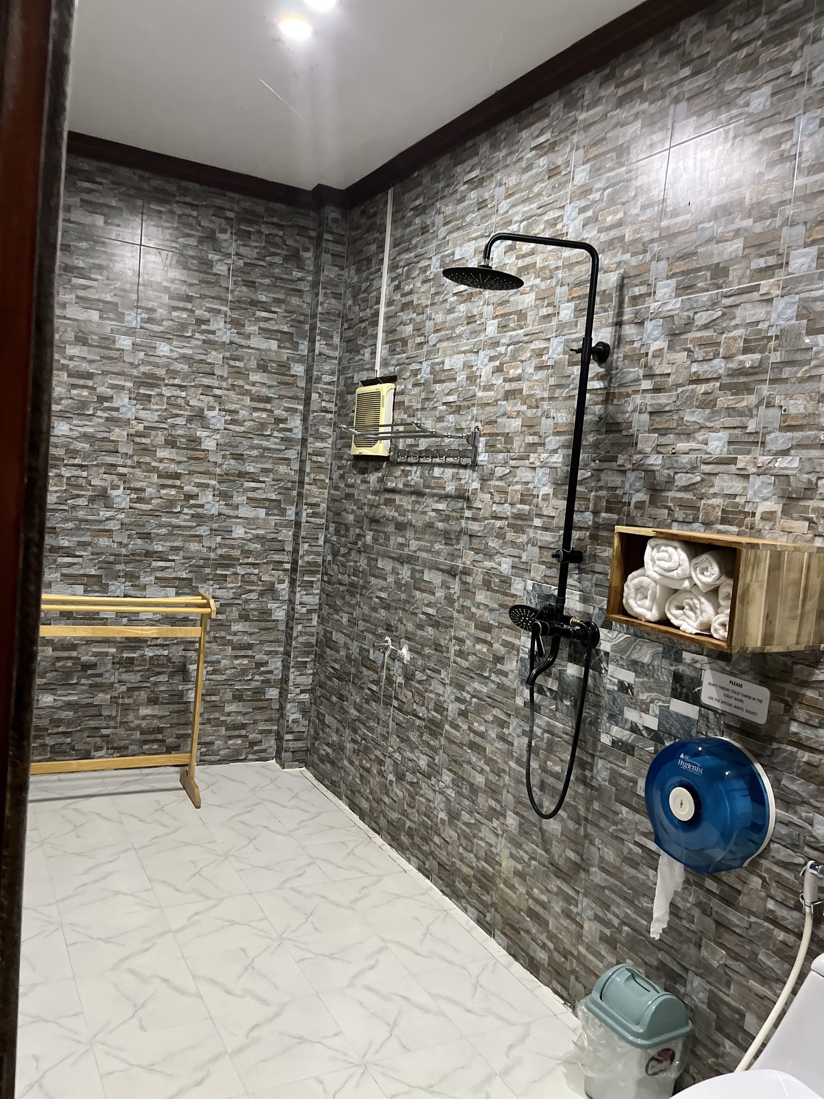 junior triple room, 1 bedroom, balcony, city view | bathroom | shower, free toiletries, slippers, towels