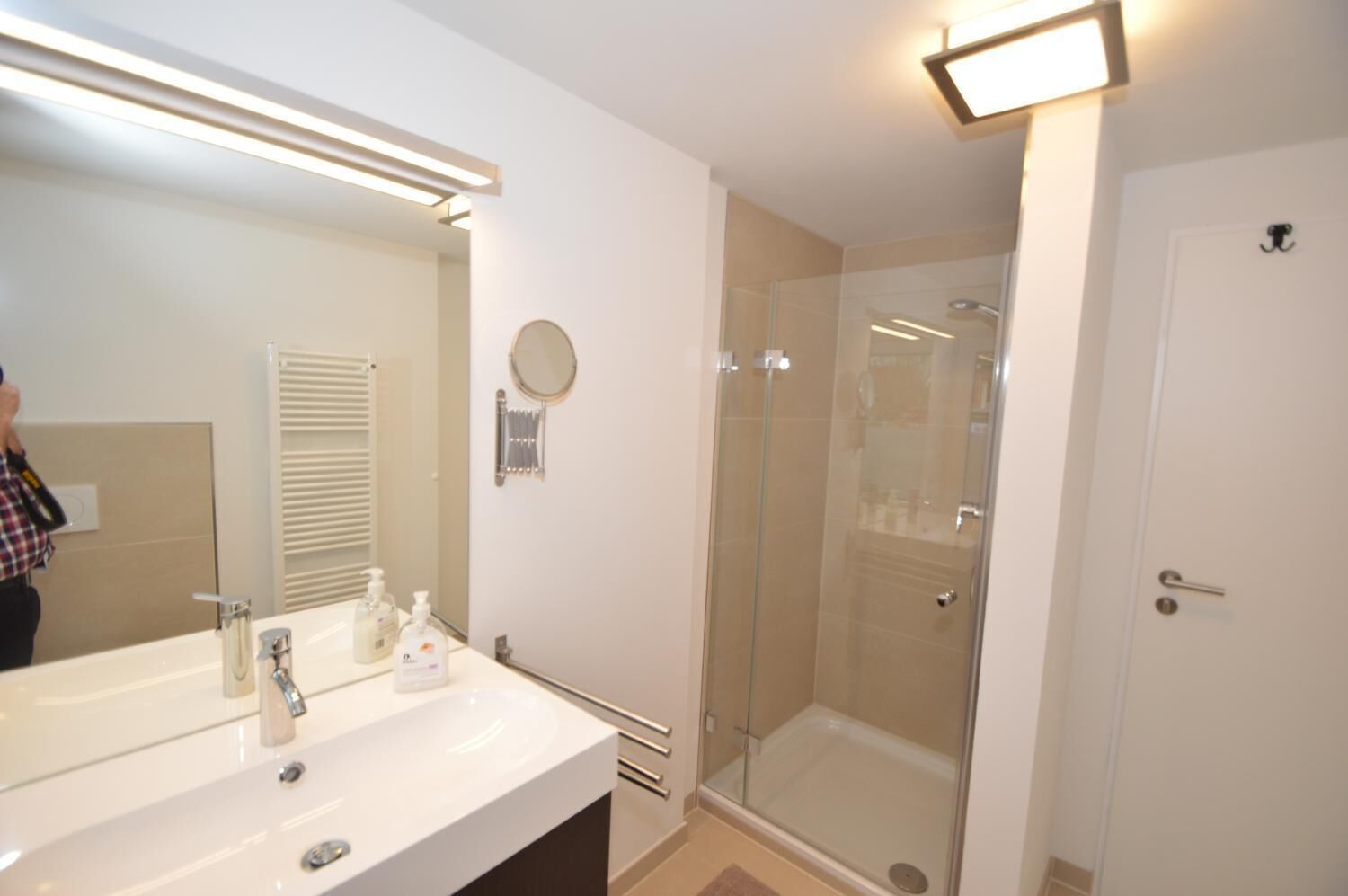 Shower, hair dryer, towels, toilet paper