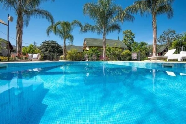 Outdoor pool, sun loungers