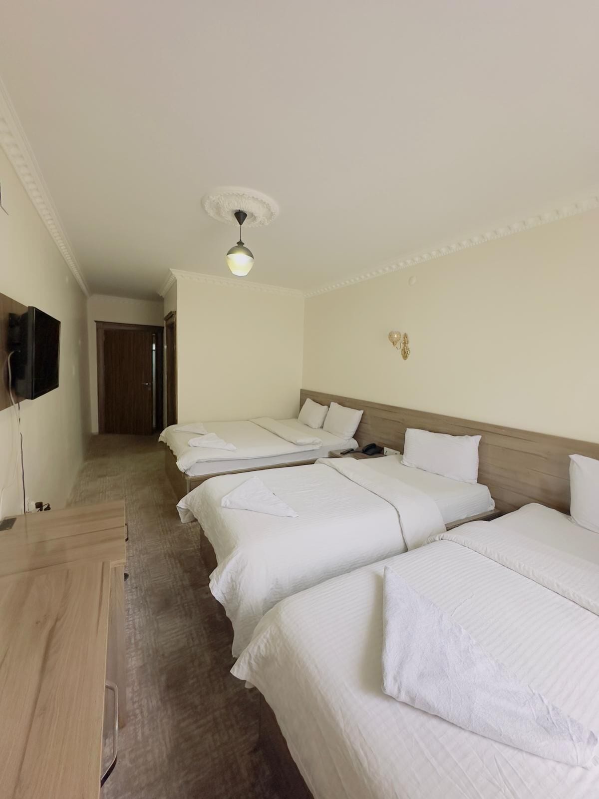 family quadruple room, non smoking | minibar, laptop workspace, blackout curtains, soundproofing