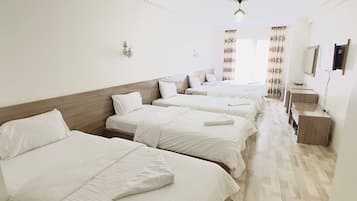 Family Room, Non Smoking | Minibar, laptop workspace, blackout drapes, soundproofing
