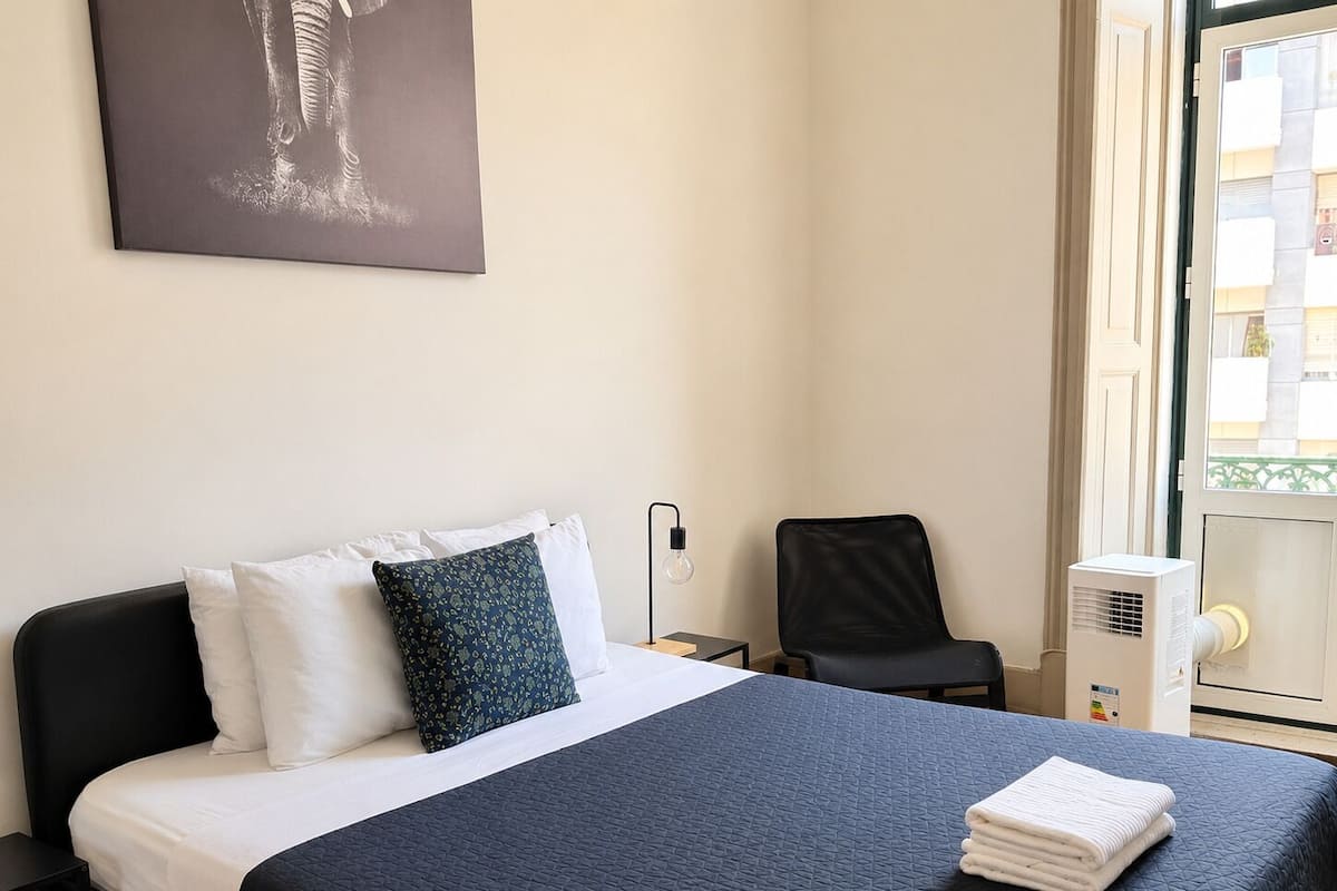 Comfort Double Room, 1 Queen Bed, Shared Bathroom, City View | Hypo-allergenic bedding, memory foam beds, free WiFi, bed sheets