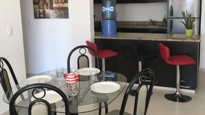 Luxury Condo, Multiple Beds, Non Smoking | Private kitchen | Coffee/tea maker, full-size fridge, microwave, oven - Aquaterra (Playa del Carmen)