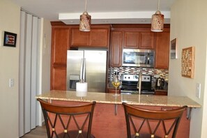 Fridge, microwave, oven, stovetop - 2 Bedroom Apartment on the Beach with the Best Pool in Condado (San Juan)