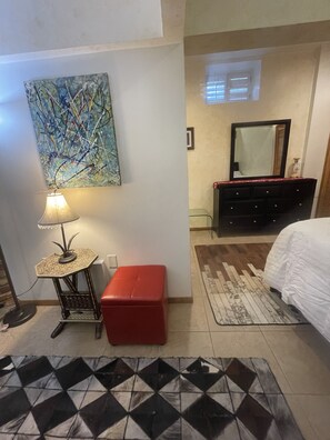 1 bedroom, desk, iron/ironing board, travel crib