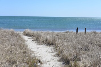 Step out your door and dip your toes into the sand!