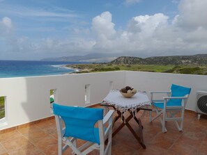 Outdoor dining - Charming Waterfront Villa in South Rhodes , near Monolithos and Prasonissi (Apolakkia)