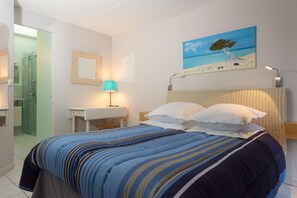 1 chambre, fer et planche à repasser, Wi-Fi gratuit, draps fournis